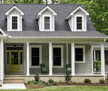 Ben Ross Roofing | Rock Hill, South Carolina | new roof installed on a nice home with landscaping surrounding its front porch